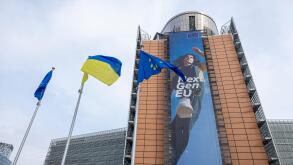 BRUSSELS, Belgium -May 7, 2022: Ukrainian and European flags blowing in front of the seat of the European Commission