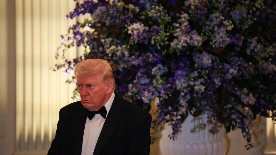 Washington, United States Of America. 21st Feb, 2026. United States President Donald J Trump lowers his head in prayer during the Governors Dinner in the East Room of the White House on February 21, 2025 in Washington, DC Credit: Samuel Corum/Pool via CNP