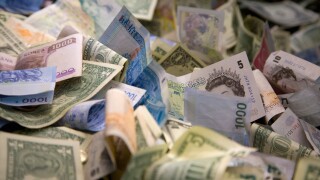 Bank notes from multiple countries in a donation box at the British Museum London England. Image shot 2007. Exact date unknown.