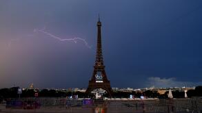Lightning strikes near the Eiffel Tower, ahead of the start of Men's 20km Race Walk, on the sixth day of the 2024 Paris Olympic Games in France. Picture date: Thursday August 1, 2024.