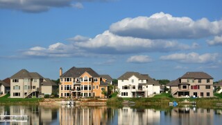 Luxury houses USA - American residential executive house homes on a suburban lake complex