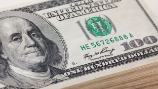 A stack of one hundred dollar bills