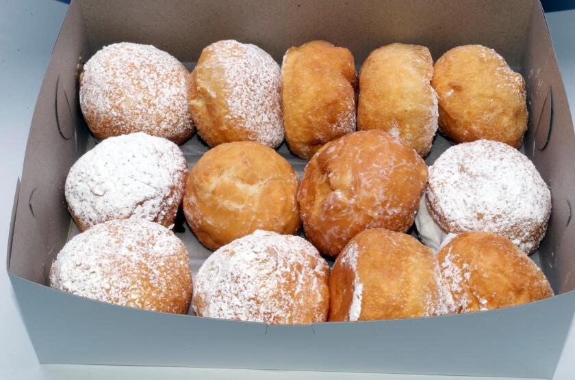 A Bakers Dozen of Donuts in a Box