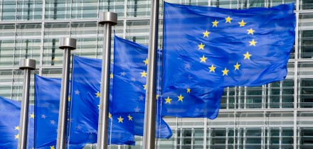 EU flags in front of European Commission in Brussels