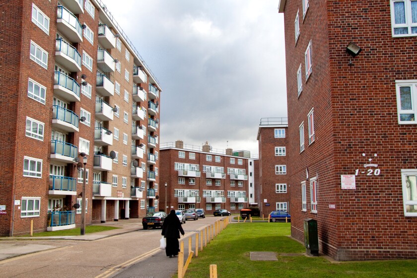 Hammersmith and Fulham council Social housing in Fulham just off Pulton Place - lone woman wearing burka