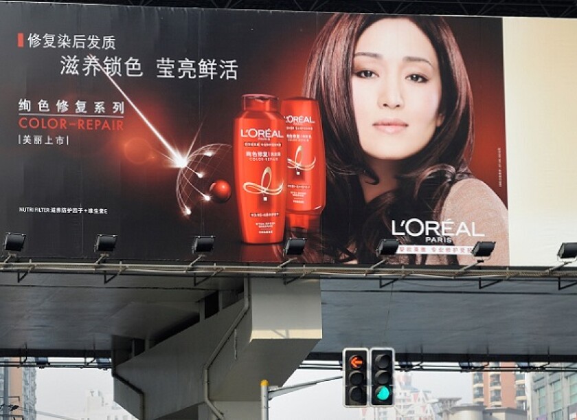L'Oreal china poster from Alamy 13Apr22 575x375