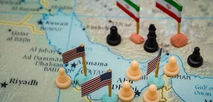 Geopolitical conflict between Iran and the USA for oil control