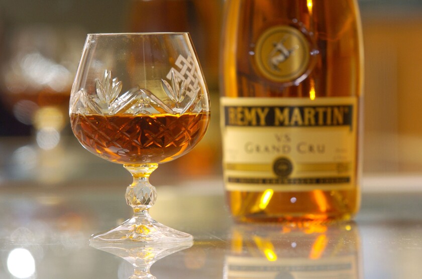 Bottle of Remy Martin cognac and glass brandy,cognac.