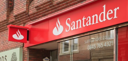 Santander bank logo and sign above the local branch front window in Wrexham, North Wales, UK, Britain