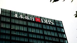 --FILE--A logo of DBS Bank, Singapore's largest lender, is pictured on a rooftop of a building in Shanghai, China, 29 August 2017.
DBS Bank, Singapo