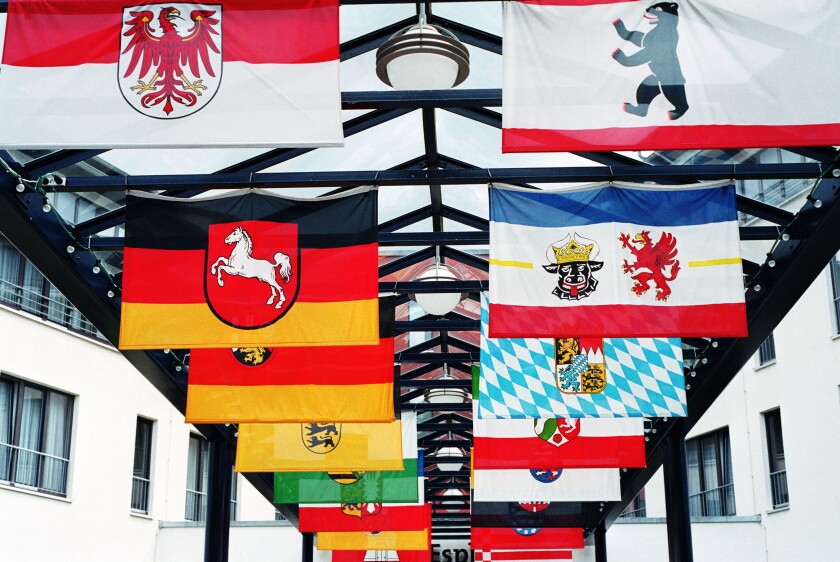 Flags of German states in front of Hotel Esplanade Resort and Spa, Bad Saarow, Germany