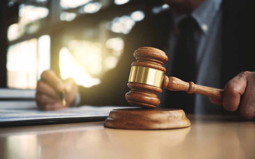 Real Estate concept judge gavel / lawyer with auction hammer