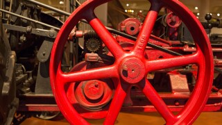 Dearborn, Michigan - Detail of a steam traction engine at the Henry Ford Museum. It was used to plow large farms around 1916.