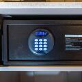 Room safe in a hotel, keypad for entering a 6-digit numerical code to lock the safe in order to deposit valuables