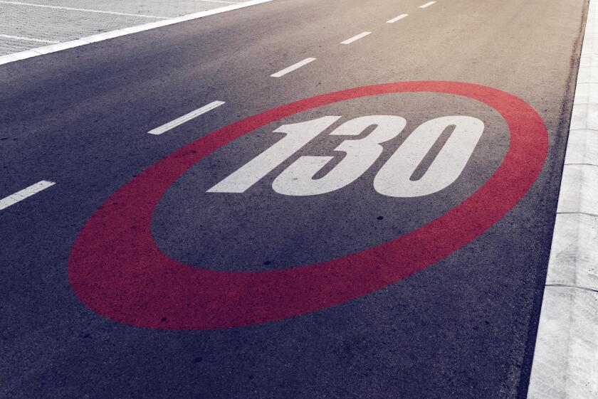 130 kmph or mph driving speed limit sign on highway, road safety and preventing traffic accident concept.