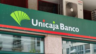 Pamplona, Spain- May 19, 2024: The sign for Unicaja Banco in Pamplona
