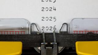2023, 2024, 2025,2026 written on an old typewriter