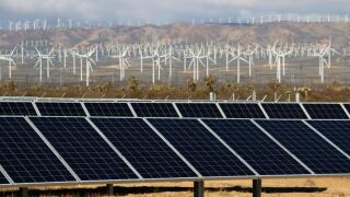 Solar panels and wind mill electric power production near Mojave California
