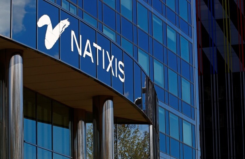 The logo of French bank Natixis is seen at one of their office in Paris, France, April 7, 2021. REUTERS/Gonzalo Fuentes