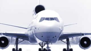 Airliner on runway large three angine jet Selective focus lens Conceptual Blue Tone