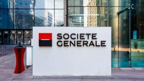 Sign of the Societe Generale at the entrance of the head office of the french banking group in La Defense business district.