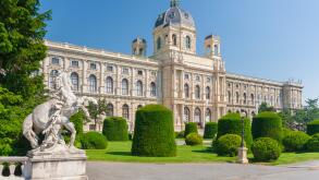 Classic view of famous Naturhistorisches Museum (Natural History Museum) with park and sculpture in Vienna, Austria