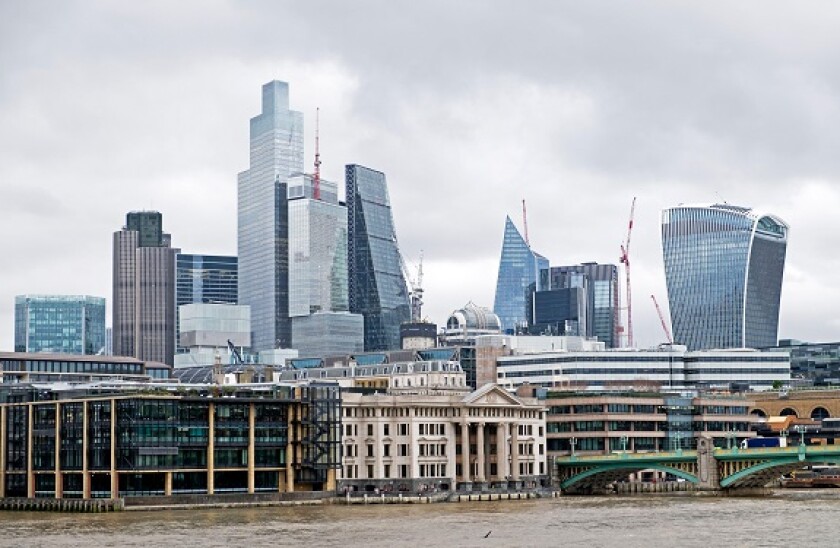 View of City of London financial centre buildings on a dull cloudy day in winter from Bankside in South London England UK Great Britain KATHY DEWITT