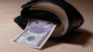 Wallet full of cash.