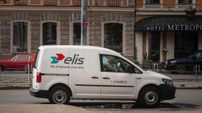 Picture of a sign with the logo of Elis on a vehicle of the firm in Riga. Elis is a French company, founded in 1969 and specialized in the field of cl