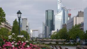 Early morning street scene in Neuilly Sur Seine looking towards La Defense and the Paris Business District