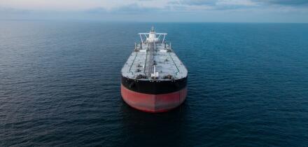 Aerial view of a large crude oil product tanker ship in the Strait Of Hormuz transporting oil and petroleum products around the world