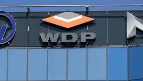 Bucharest, Romania - August 16, 2021: A logo of WDP, Warehouses De Pauw, Belgium logistics for warehouse rentals company, is displayed on the top of a