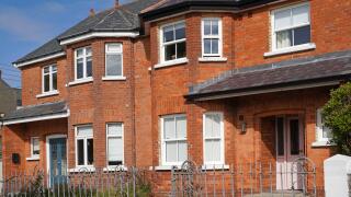 Row of traditional older semi-detached houses