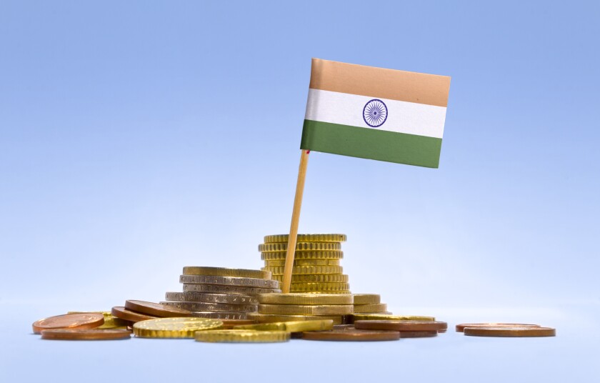 Flag of India in a stack of coins-adobe-2022