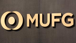 A new signboard of MUFG on display outside its branch on April 2, 2018, Tokyo, Japan. Mitsubishi UFJ Financial Group Inc. changed the name of Bank of Tokyo-Mitsubishi UFJ to MUFG Bank after 11 years of merger and complaints from customers saying that the 