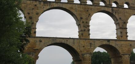 Three tiers of arches form the Pont du Gard, the Roman aqueduct over the Gardon River and now a UNESCO World Heritage Site.