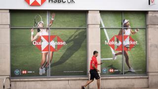 British tennis player, Emma Raducanu who is sponsored by HSBC appears on a giant billboard in Wimbledon town centre, during the first week of competition of the Wimbledon Lawn Tennis Association championships, on 30th June 2022, in London, England. Raduca