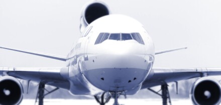 Airliner on runway large three angine jet Selective focus lens Conceptual Blue Tone