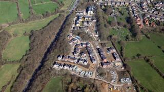 aerial view of new housing being built by Stonewater Homes near Horsforth Cemetery, Leeds