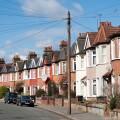 Row of terraced houses in residential Street, London, England, UK