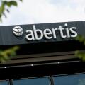 A logo sign outside of the headquarters of Abertis Infraestructuras in Barcelona, Spain on August 24, 2017.