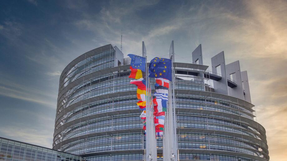 European flags in the wind, Louise-Weiss building, seat of the European Parliament in Strasbourg, France, Europe