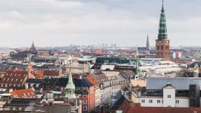 Copenhagen cityscape with spire of ol City Hall at winter day. Photo taken from The Round Tower, popular old city landmark and viewpoint. Denmark
