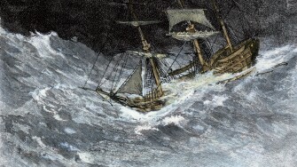 Sailing-ship struggling through stormy seas. Hand-colored woodcut