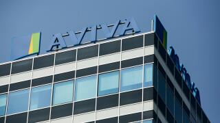 A logo sign outside of a facility occupied by Aviva in Milan, Italy on September 3, 2016.