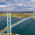 Detroit, Michigan - The Ambassador Bridge, linking the United States (foreground) and Canada over the Detroit River.