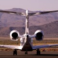 Rear view of Executive Jet on air strip apron in Nevada USA