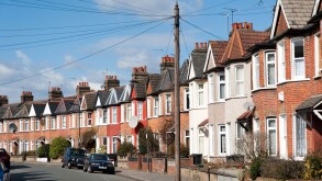 Row of terraced houses in residential Street, London, England, UK