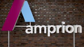 Pulheim, Germany. 16th June, 2021. The logo of the transmission system operator Amprion. The energy company Amprion comments on the topic of climate neutrality and system security. Credit: Oliver Berg/dpa/Alamy Live News