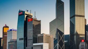 Hong Kong Skyscrapers - Modern Skyscraper towers on the waterfront on Hong Kong island, Hong Kong China. Bank of China buildings & Cheung Kong Centre.
